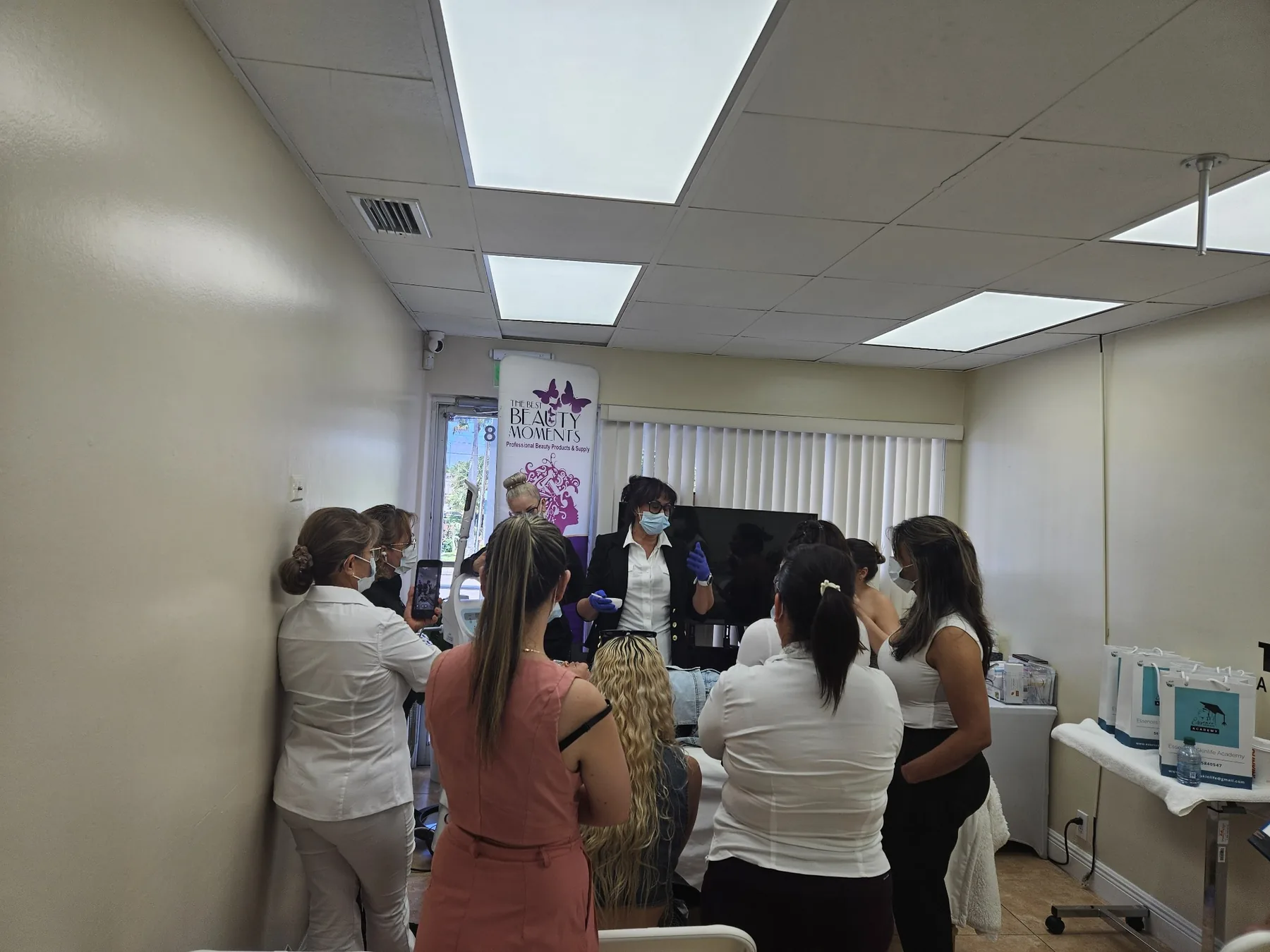 Students gathered around Karina during a practical demonstration